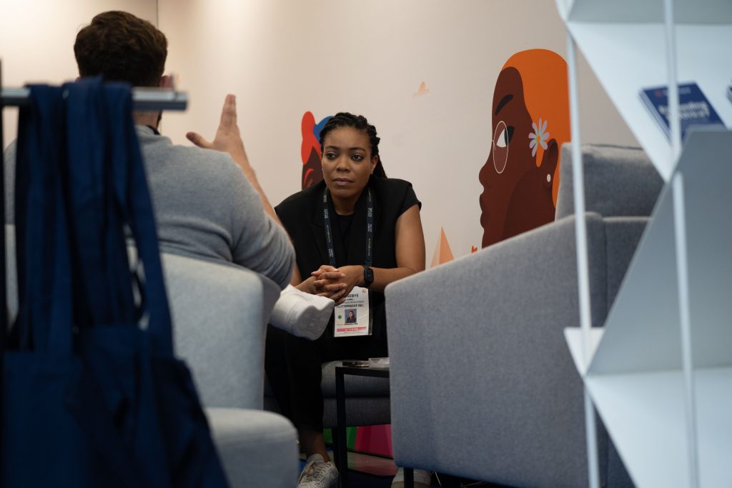A Flutterwave Executive, Chinenye Agwu, engaging with a stakeholder at Money 20/20 Europe