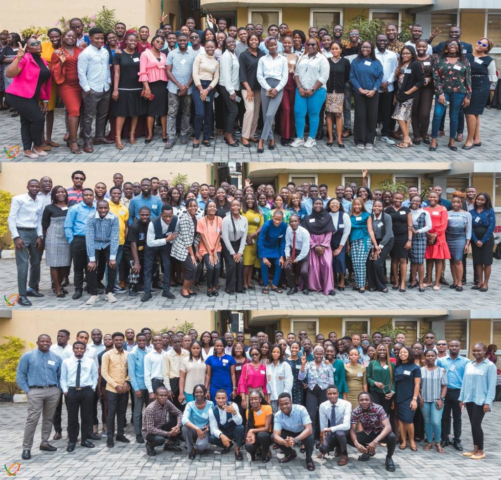 Three stacked photos showing a large group of young African professionals smiling together during the Flutterwave Graduate Trainee Programme in August 2022.
